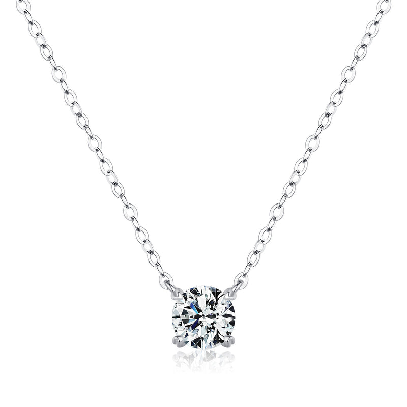 Overhead flat lay of necklace with minimalist styling and soft fabric backdrop