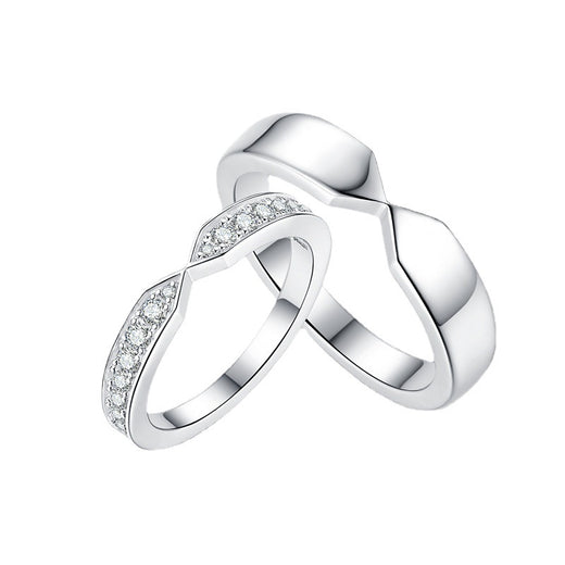 Close-up of moissanite stone in women's ring with soft focus background