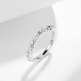 Close-up of the brilliant 3.0mm moissanite stone under natural lighting