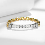 Close-up of nine round 4.0mm moissanite stones with brilliant facet detail