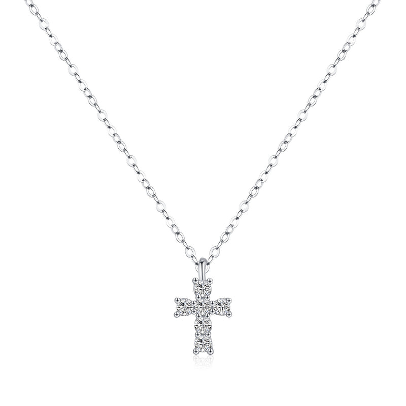 Close-up of pavé-set zirconia stones on minimalist cross pendant