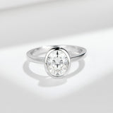 Close-up of brilliant 7×9 mm oval moissanite stone with triple excellent cut