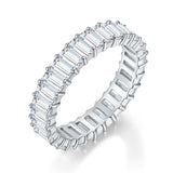 Front view of emerald-cut moissanite stack ring in sterling silver on white background