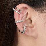 Front view of FITINY geometric moissanite ear cuff on white background