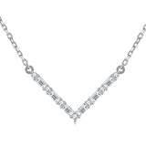Side angle of cross-link chain and V pendant showing delicate proportions and craftsmanship