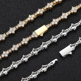 Close-up of zirconia stone settings on white gold tennis chain