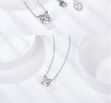 Necklace in hand showing weight, texture, and comfortable grip