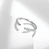 Side angle detail of moissanite stone on solitaire ring R3-0051 with 18K gold plating highlight