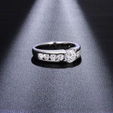 Close-up of brilliant round moissanite center stone with precise 3EX cut and fire reflection