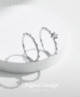 Top-down of band ring emphasizing geometric alignment and sparkle