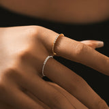 Side profile showing low-profile band thickness and smooth contour