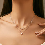 Front view of FITINY geometric double-layer clavicle necklace in polished sterling silver on white background