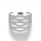 Top-down macro shot highlighting wave pattern and metal luster