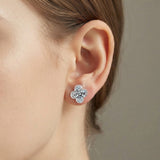 Woman wearing the S925 moissanite four-leaf clover stud earring in sterling silver