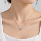 Minimalist Four-Prong Moissanite Pendant Necklace in Sterling Silver – worn by a woman, true-to-size [FITINY]