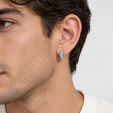 Horus Eye Emerald-Blue Moissanite Stud Earrings – worn by a man, true-to-size [FITINY]