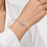 Infinity Symbol D-Color VVS1 Moissanite Bracelet in Sterling Silver – worn by a woman, true-to-size [FITINY]