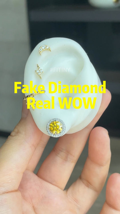 Yellow Halo Stud Earring Shown on an Ear Display