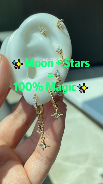 Gold Moon and Star CZ Earrings on White Ear Display
