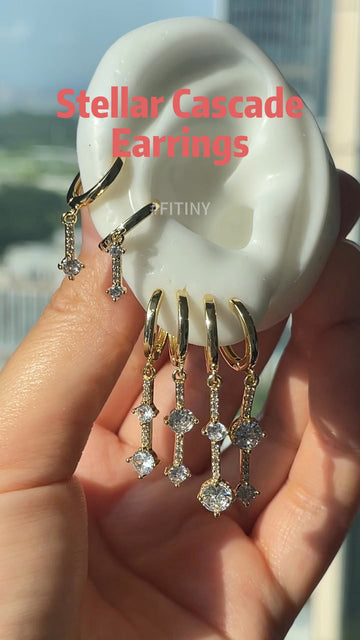 Gold Star Cascade Earrings with Crystal Drop Details