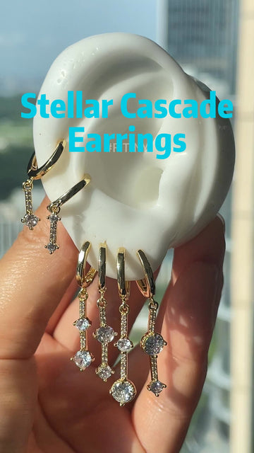 Gold Star and Moon Cascade Earrings on Display