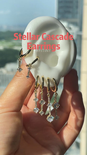 Gold Star Cascading Drop Earrings on Ear Display