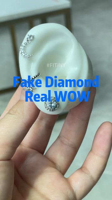 Silver CZ Halo Studs Shown on an Ear Display