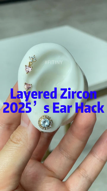 Gold-Tone Layered Zircon Earrings on an Ear Display