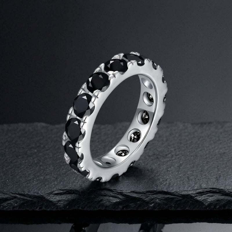 Black moissanite eternity stack ring in S925 sterling silver on dark slate