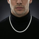 Man wearing a 3mm iced out moissanite tennis chain necklace
