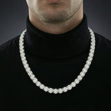 Man wearing a 5mm iced out moissanite tennis chain necklace