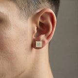 Man wearing a gold magnetic square CZ stud earring
